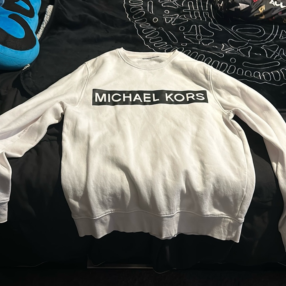 white MK sweater